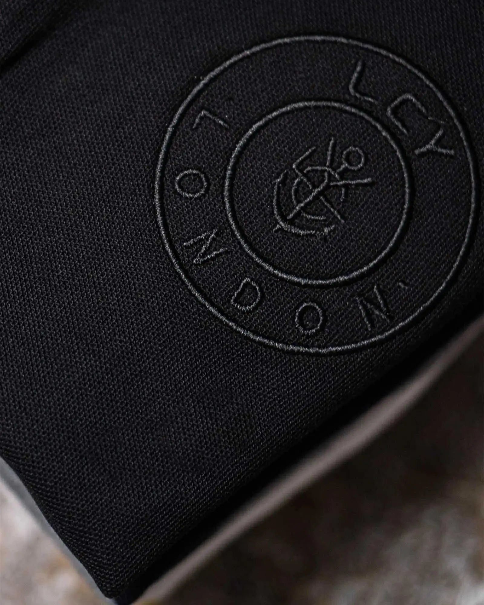 LCY LONDON | Embroidered Pocket Circle Logo Polo Shirt LCY London
